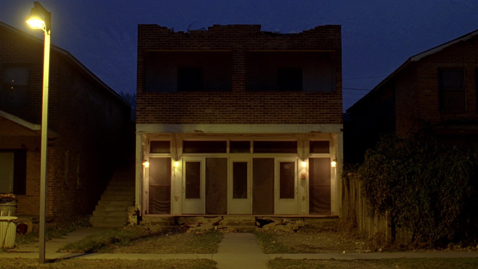 Distressed duplex property in Dallas County after acquisition