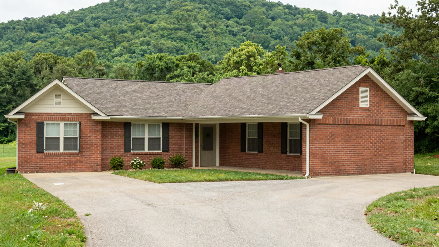 Bright, tidy single-story Tennessee home with a well-kept yard, the kind of paid-off house a senior can sell as-is without repairs