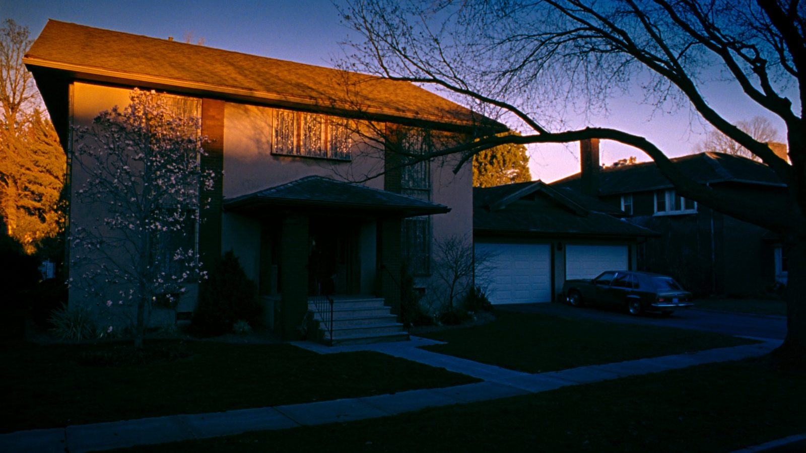 East Cleveland and Lakewood Ohio residential streetscapes representing contrasting Cuyahoga County rental markets