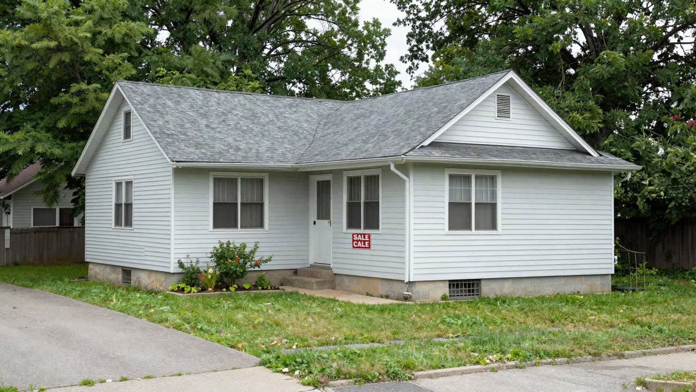 Cuyahoga County Cleveland real estate investor reviewing an off-market distressed property list with county foreclosure data