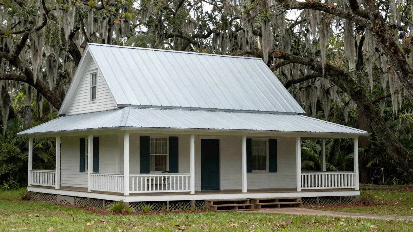 Bright, well-maintained single-family home in South Carolina with a covered front porch, the kind of house an heir inherits and sells