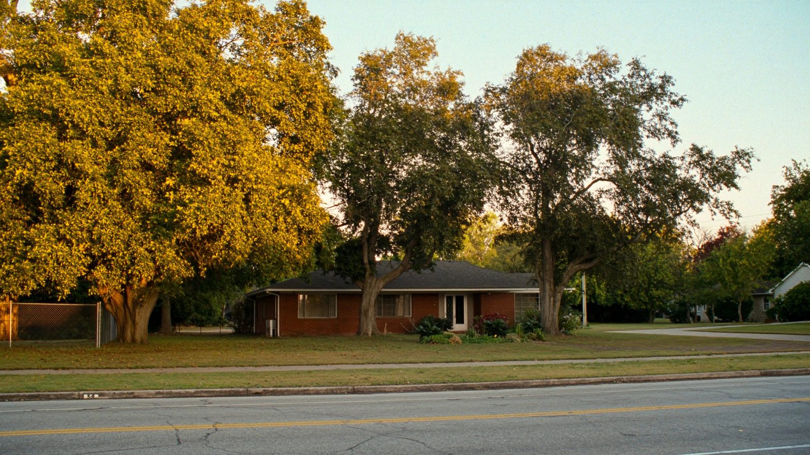 Real estate agent in Dallas-Fort Worth Texas reviewing property documents and house keys to sell house fast to cash home buyers
