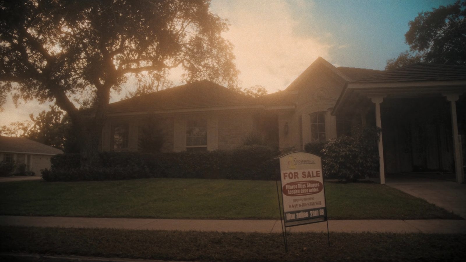 Suburban house in Houston Texas with for sale sign on lawn, representing the slow 2026 housing market